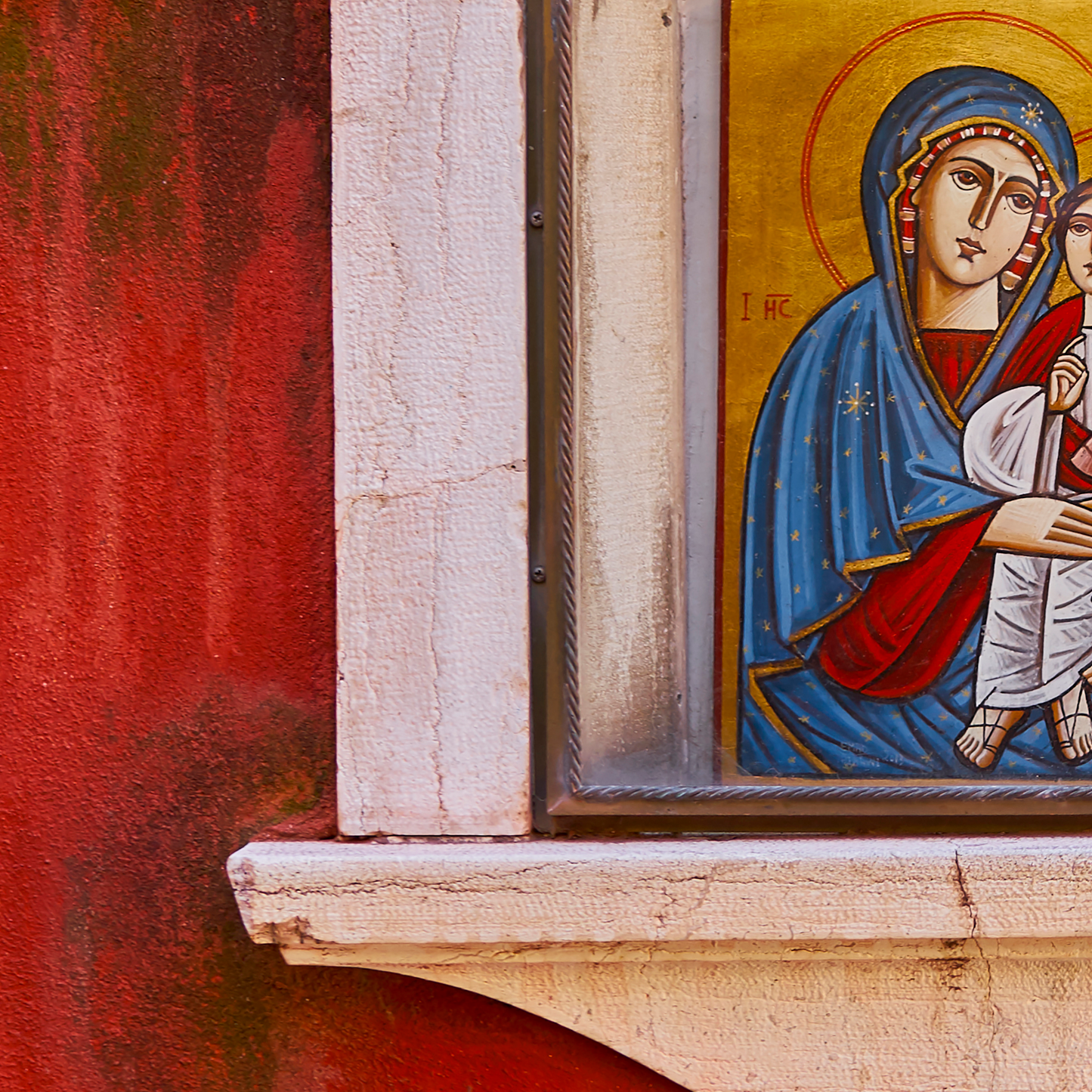 Icon of a religious figure with a red background