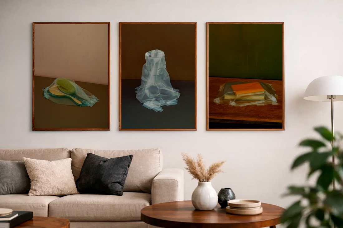 Three beautifully framed prints on the wall of a modern lounge room wall