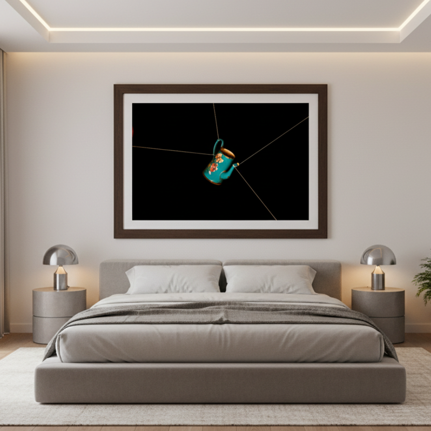 Modern bedroom with a bed, nightstands, and a framed artwork on the wall.