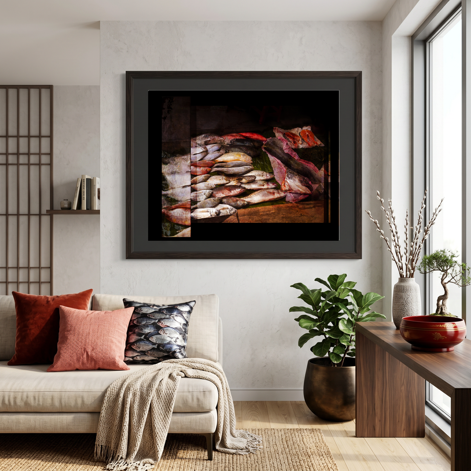 Framed artwork above a sofa in a living room with plants and decor.