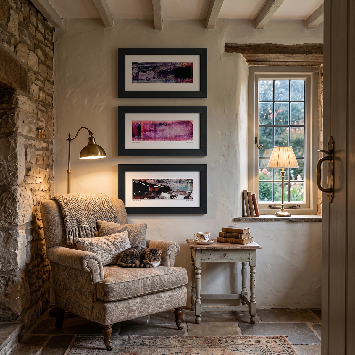 Three framed abstract art prints displayed together on a wall in a modern interior setting.
