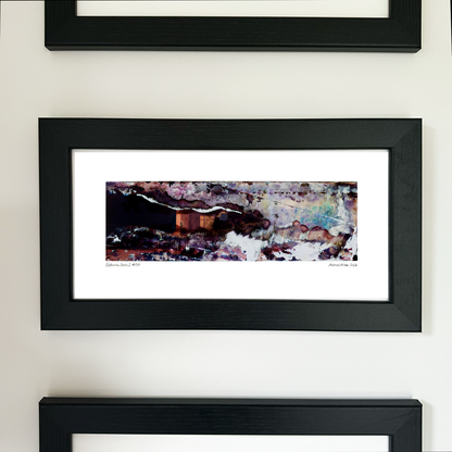A framed abstract art print with a black frame and white mat, featuring Naturalia II #029 in black, purple and blue tones, mounted on a white wall.
