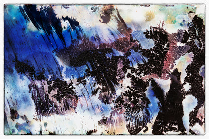 Abstract art piece with a mix of blue, black, and white colors.