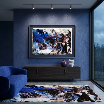 Modern living room with abstract art on the wall and rug.