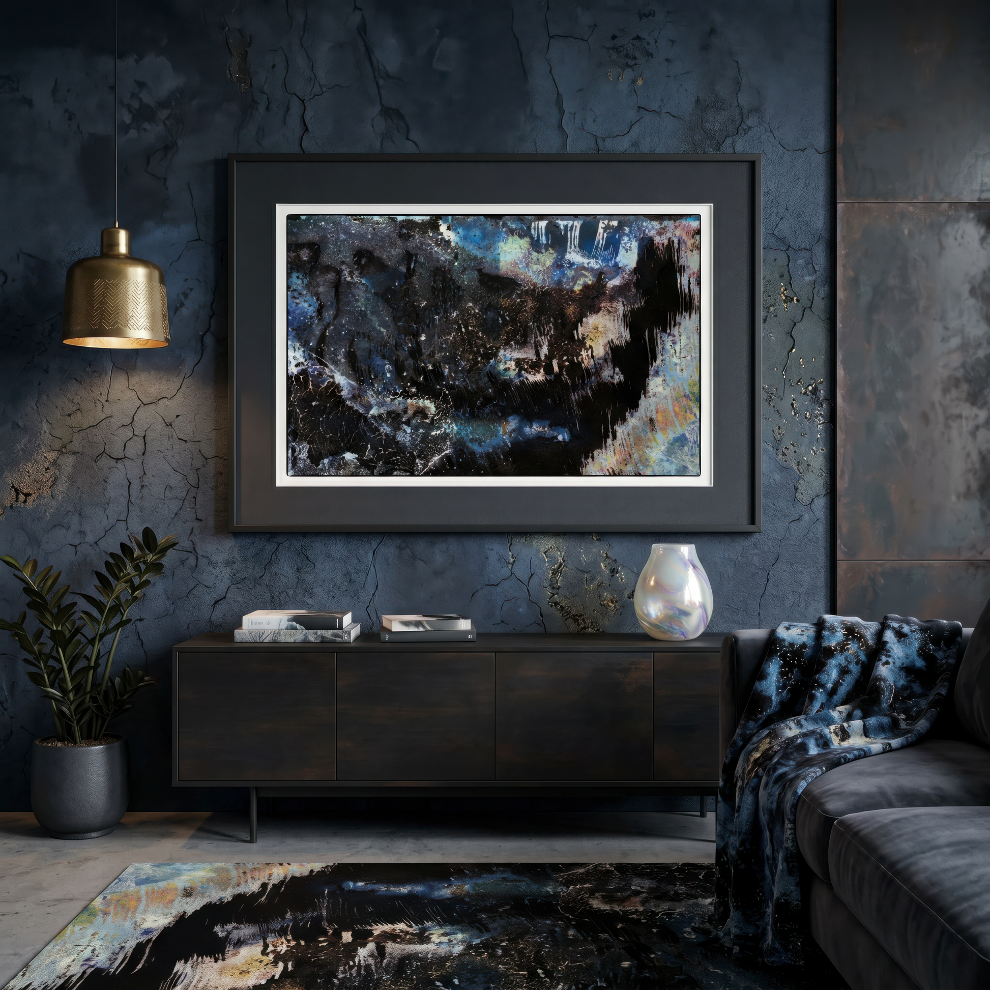 Framed abstract art piece on a dark wall above a console table in a modern living room.