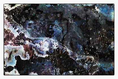 Abstract art piece with a cosmic or nebula-like design.