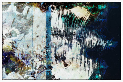 Abstract art with splashes of blue, white, and black on a dark background