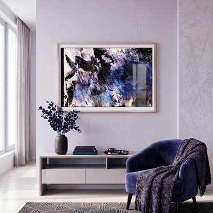 Modern living room with abstract art, purple chair, and decorative items.