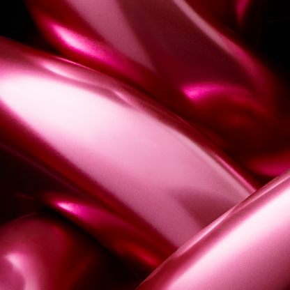 Close-up of pink satin object with a glossy finish