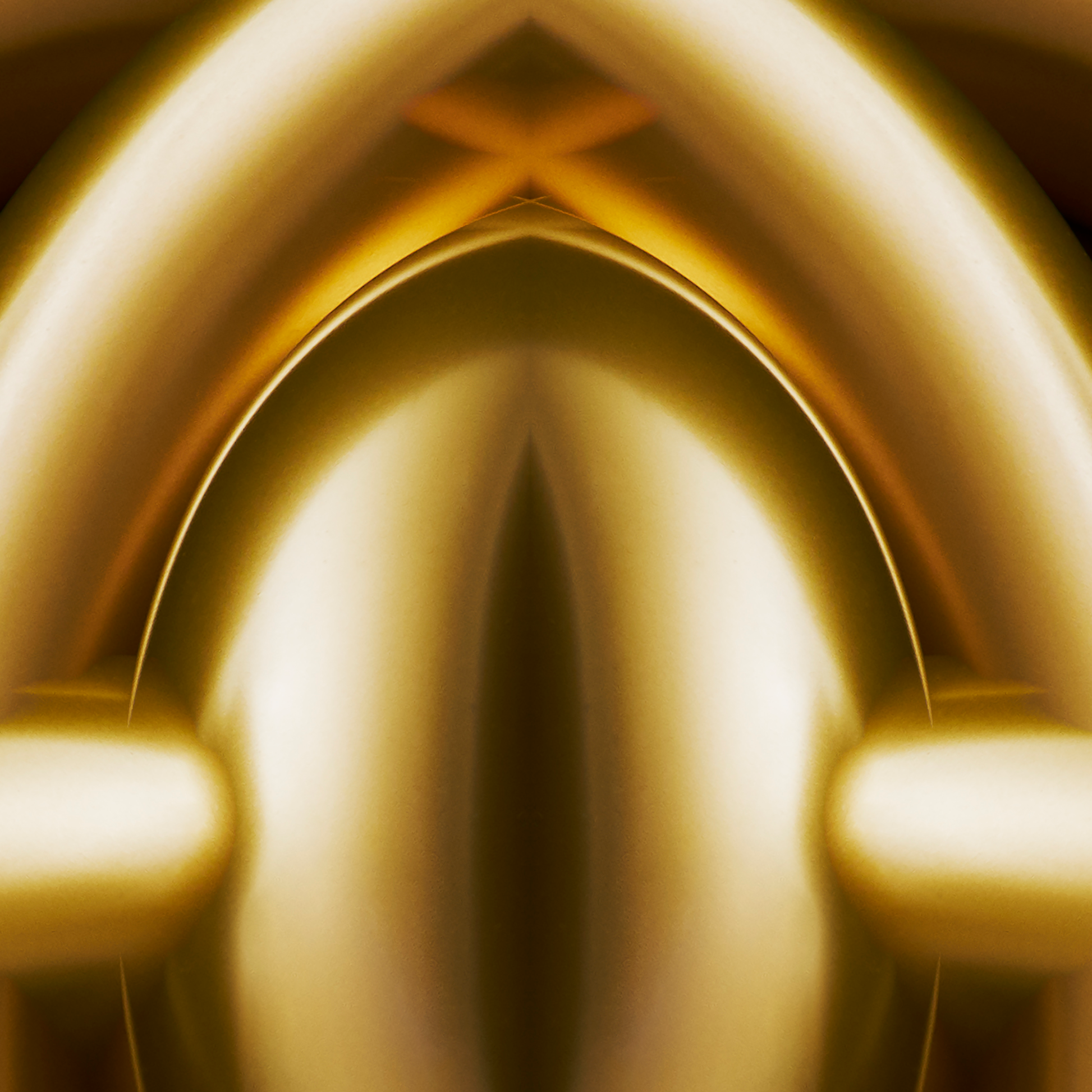 Close-up of a gold metallic object with reflective surface