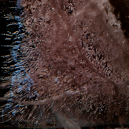 Close up of detail of photograph of ladies underwear frozen in a block of ice