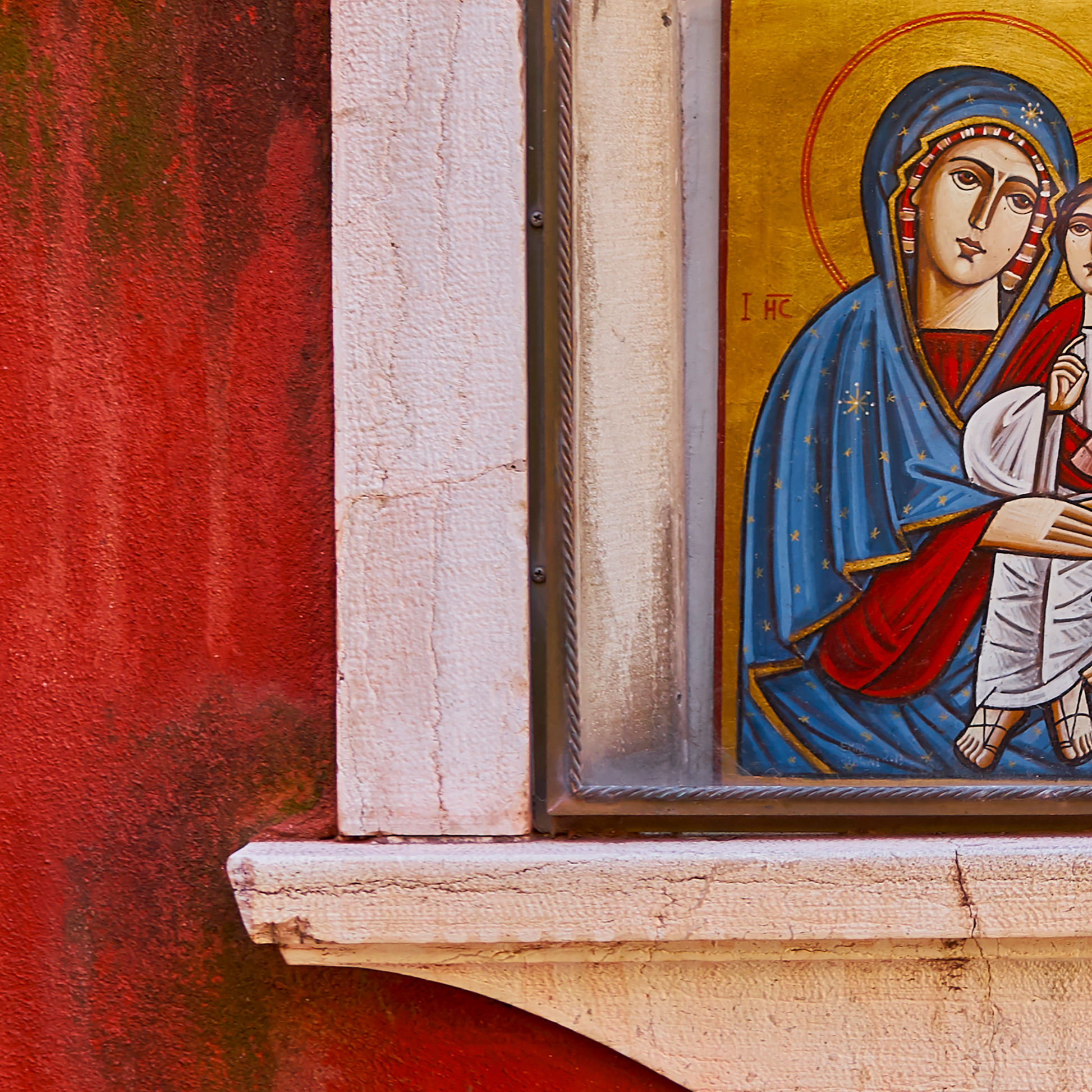 Icon of a religious figure with a red background