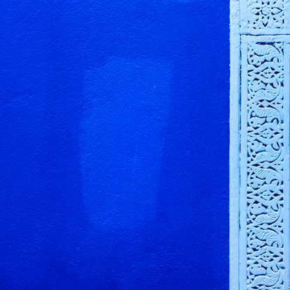 Blue textured surface with a decorative white border