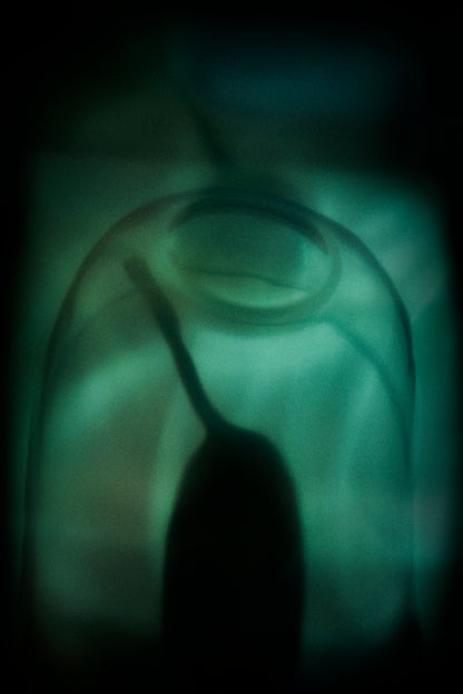 Warped reflection of objects creating abstract shapes, exploring how memories change over time