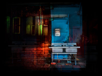 Multiple exposures of run down buildings in Taiwan Kitchen sink with blue wall and brick floor