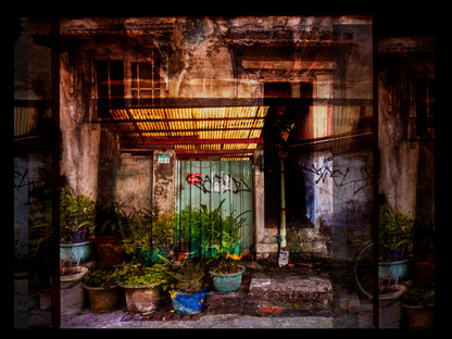 Multiple exposure photograph of a courtyard with potted plants and a door in Taiwan