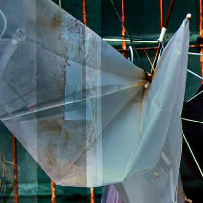 Close-up of a transparent plastic sheet with a white object on a blurred background