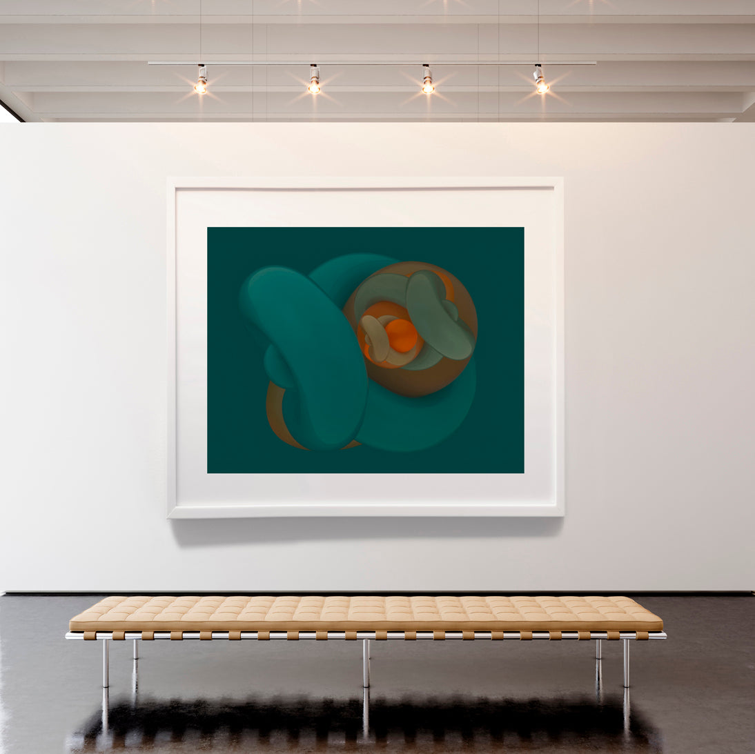 Framed abstract artwork on a white wall with a wooden bench below.